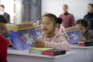 Na china, cristãos ensinam a Bíblia a seus filhos, mesmo sofrendo ameaça de prisão